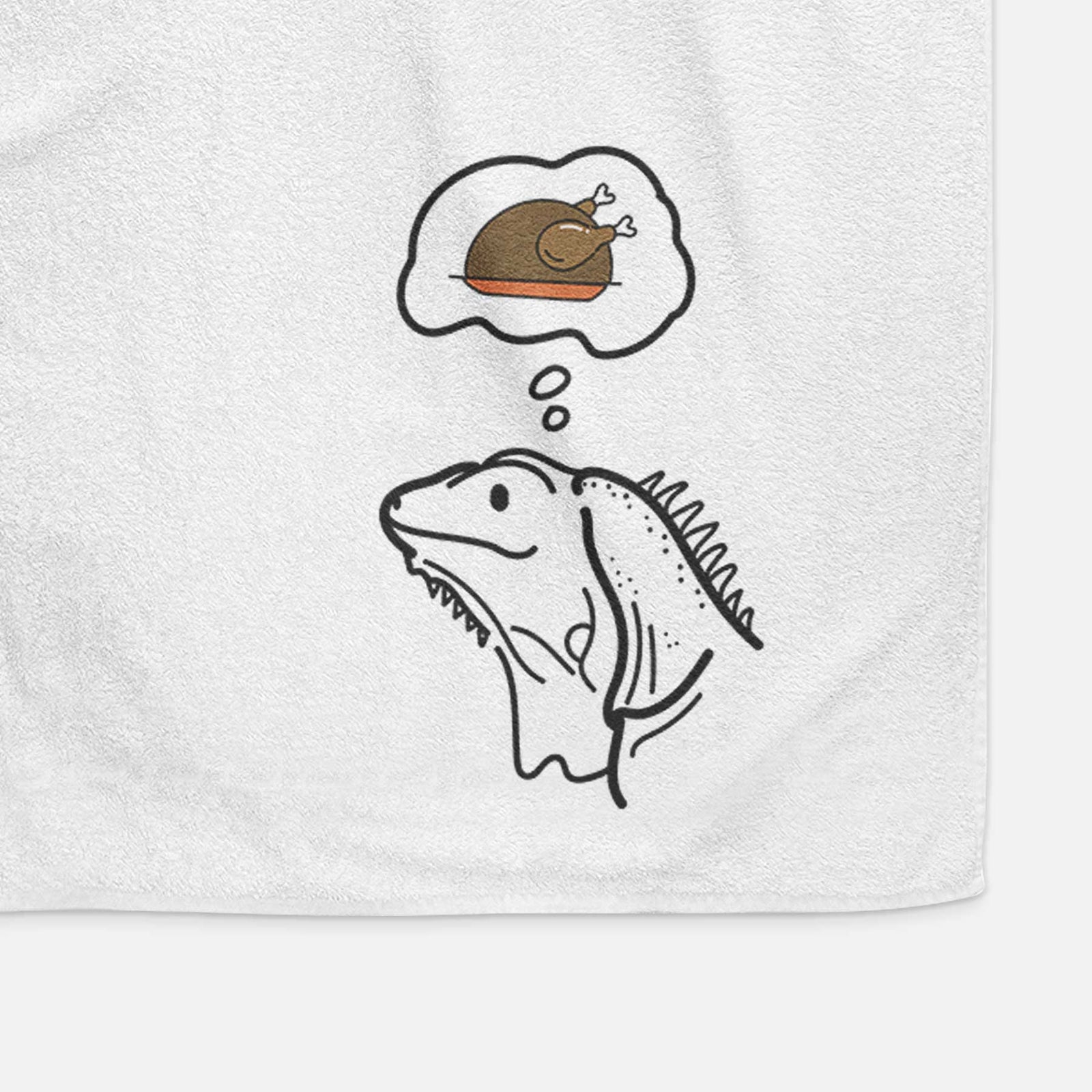 Minimalist line drawing of Louie the Iguana with a little turkey on a decorative hand towel