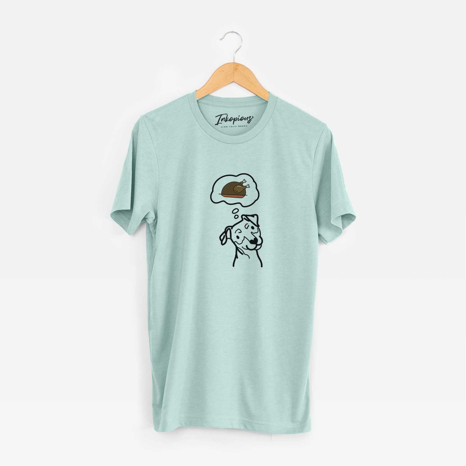 Minimalist line drawing of a Mini Pinscher with a little turkey on a Heather Sage Unisex crewneck