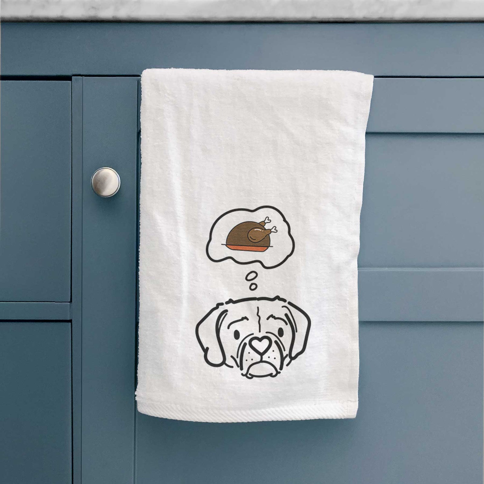 Minimalist line drawing of Mitzi the Puggle with a little turkey on a decorative hand towel
