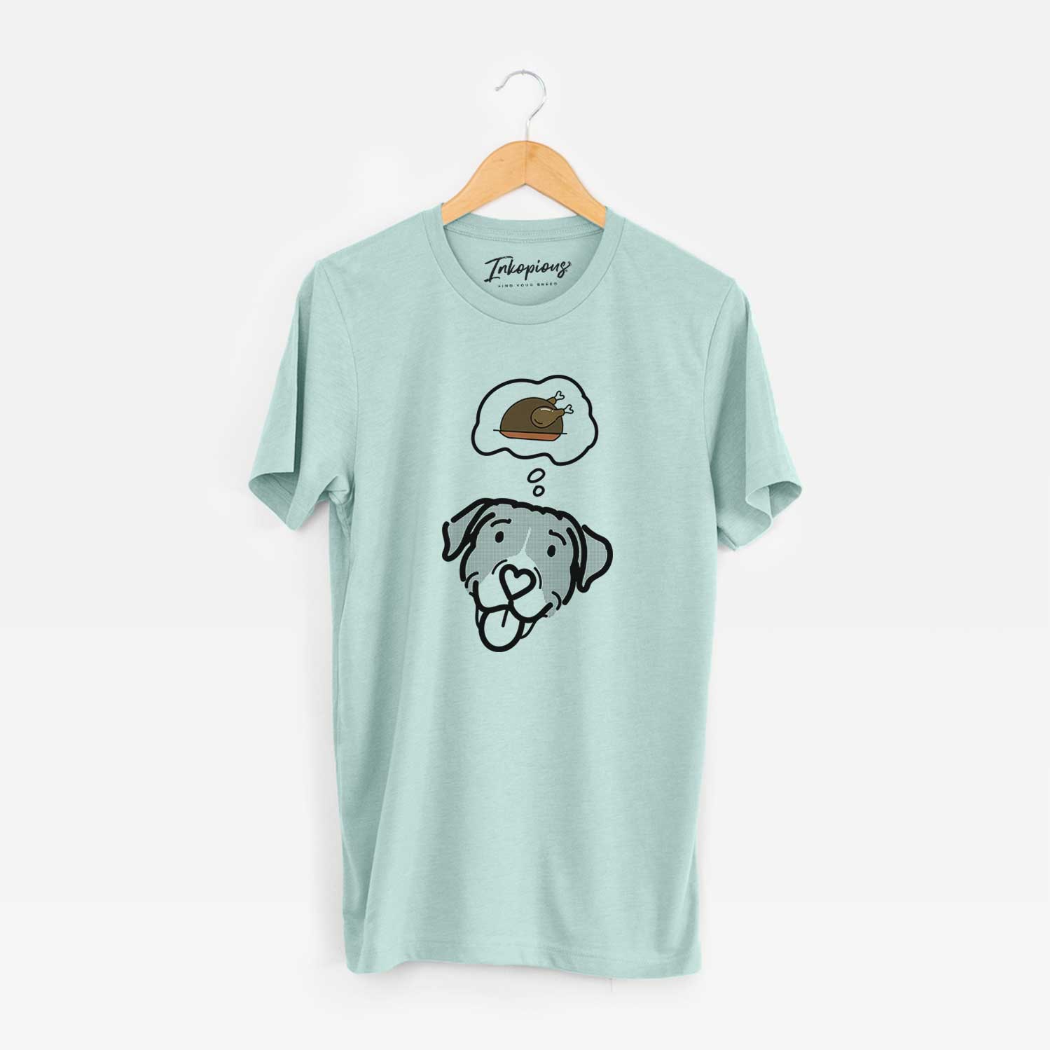 Minimalist line drawing of Shadow the Pitbull Mix with a little turkey on a Heather Sage Unisex crewneck
