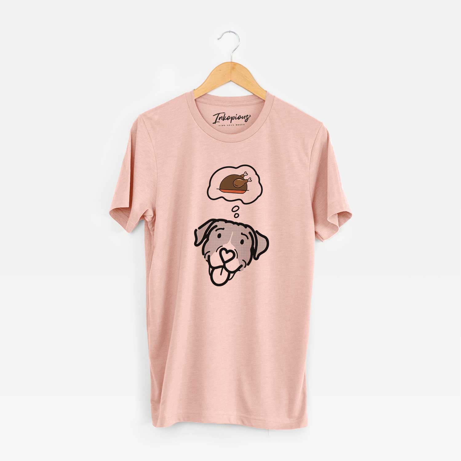 Minimalist line drawing of Shadow the Pitbull Mix with a little turkey on a Peach Unisex crewneck