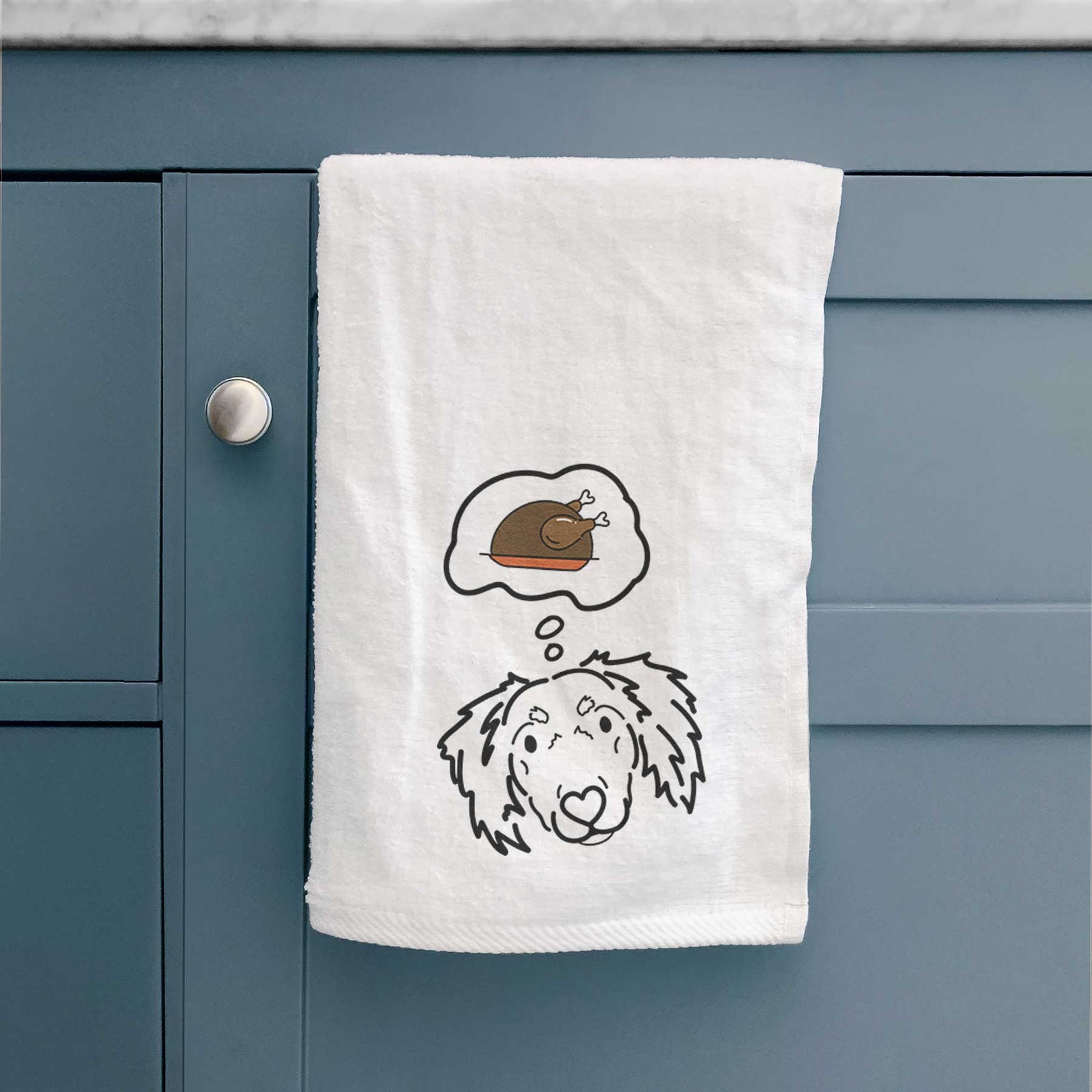 Minimalist line drawing of Tilly the Dachshund Mix with a little turkey on a decorative hand towel