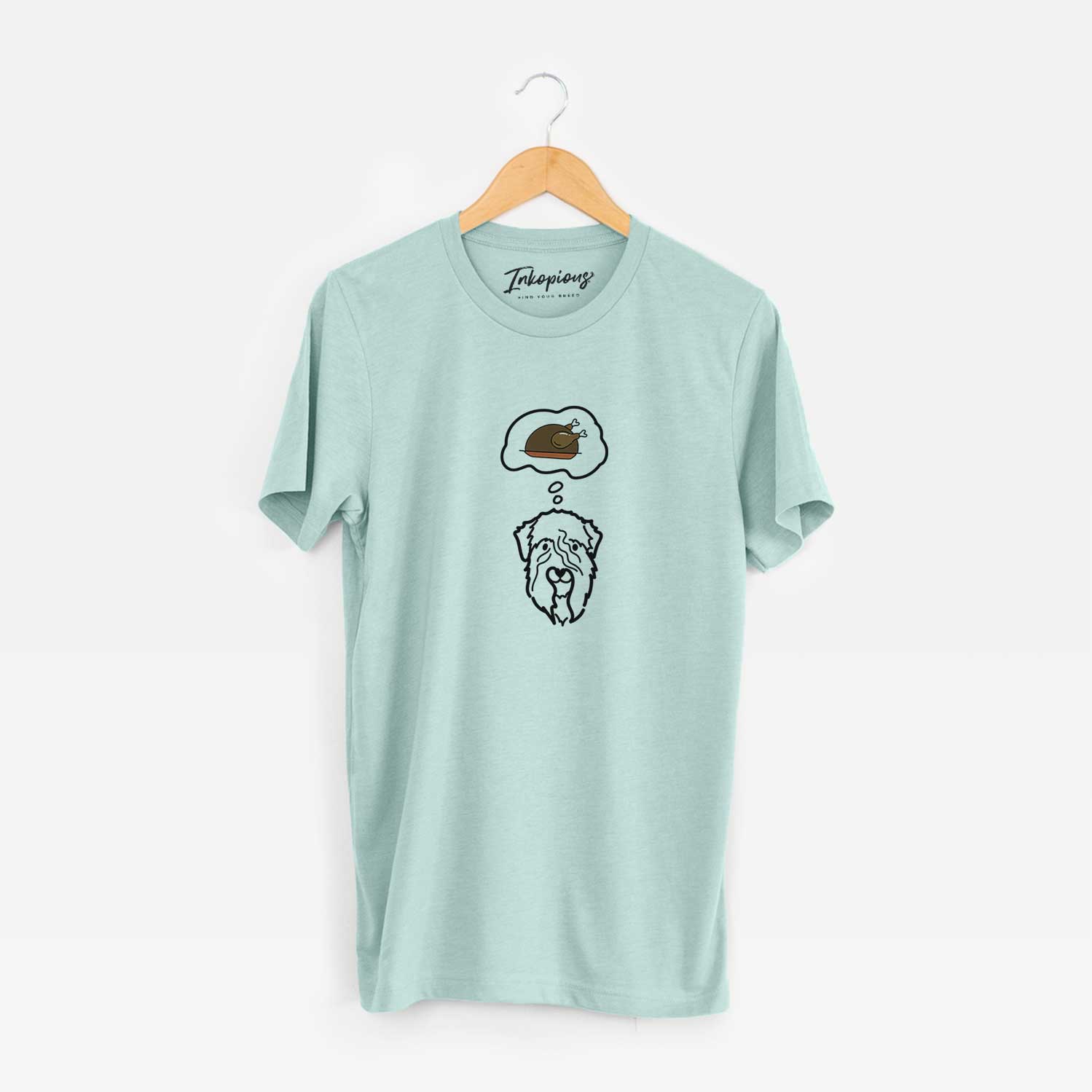 Minimalist line drawing of a Soft Coated Wheaten Terrier with a little turkey on a Heather Sage Unisex crewneck