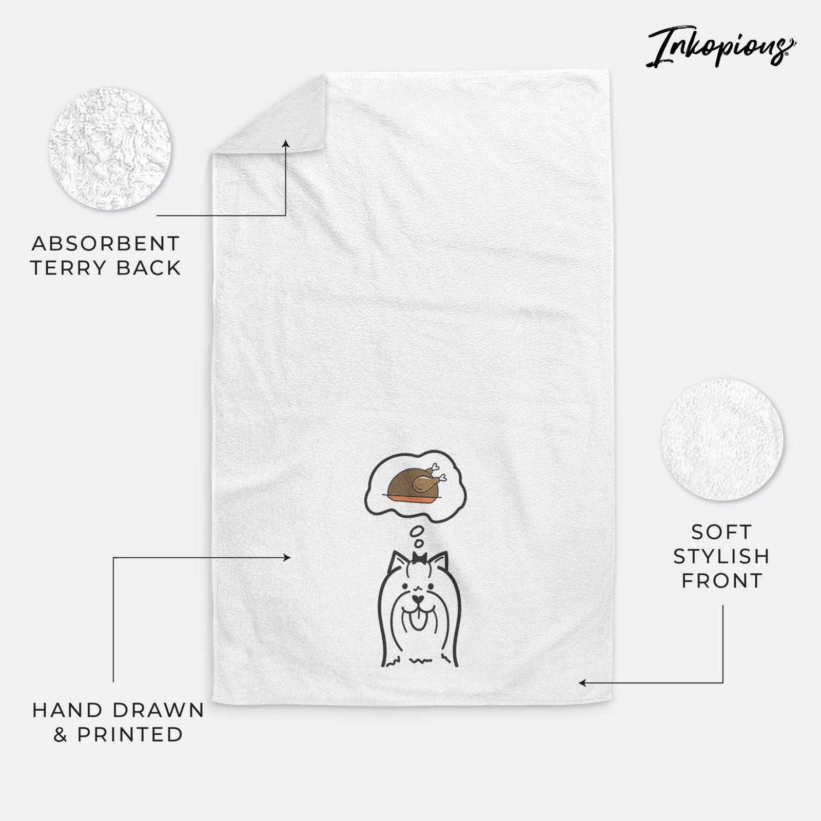 Minimalist line drawing of a Yorkshire Terrier with a little turkey on a decorative hand towel