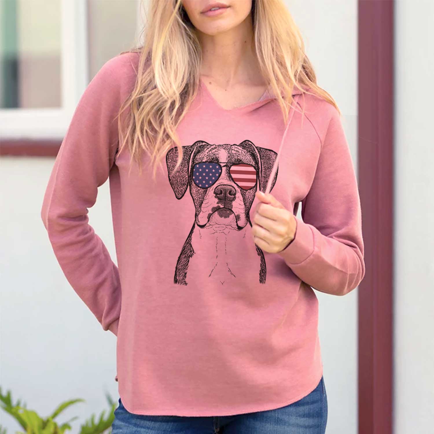 Hand-drawn sketch of Annie the Boxer wearing American flag sunglasses on a Dusty Rose Cali Wave Hooded Sweatshirt, lifestyle photo