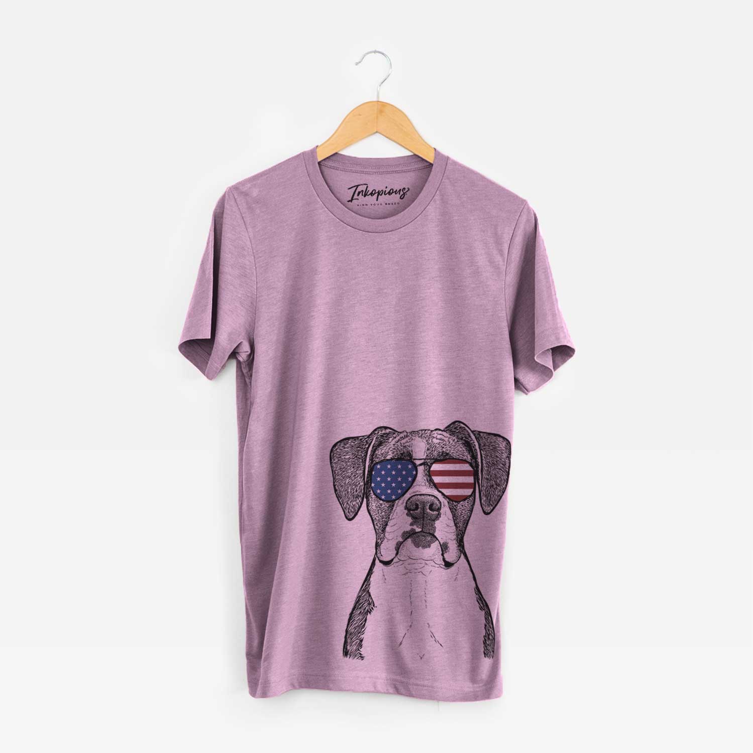 Hand-drawn sketch of Annie the Boxer wearing American flag sunglasses on an Orchid Unisex crewneck
