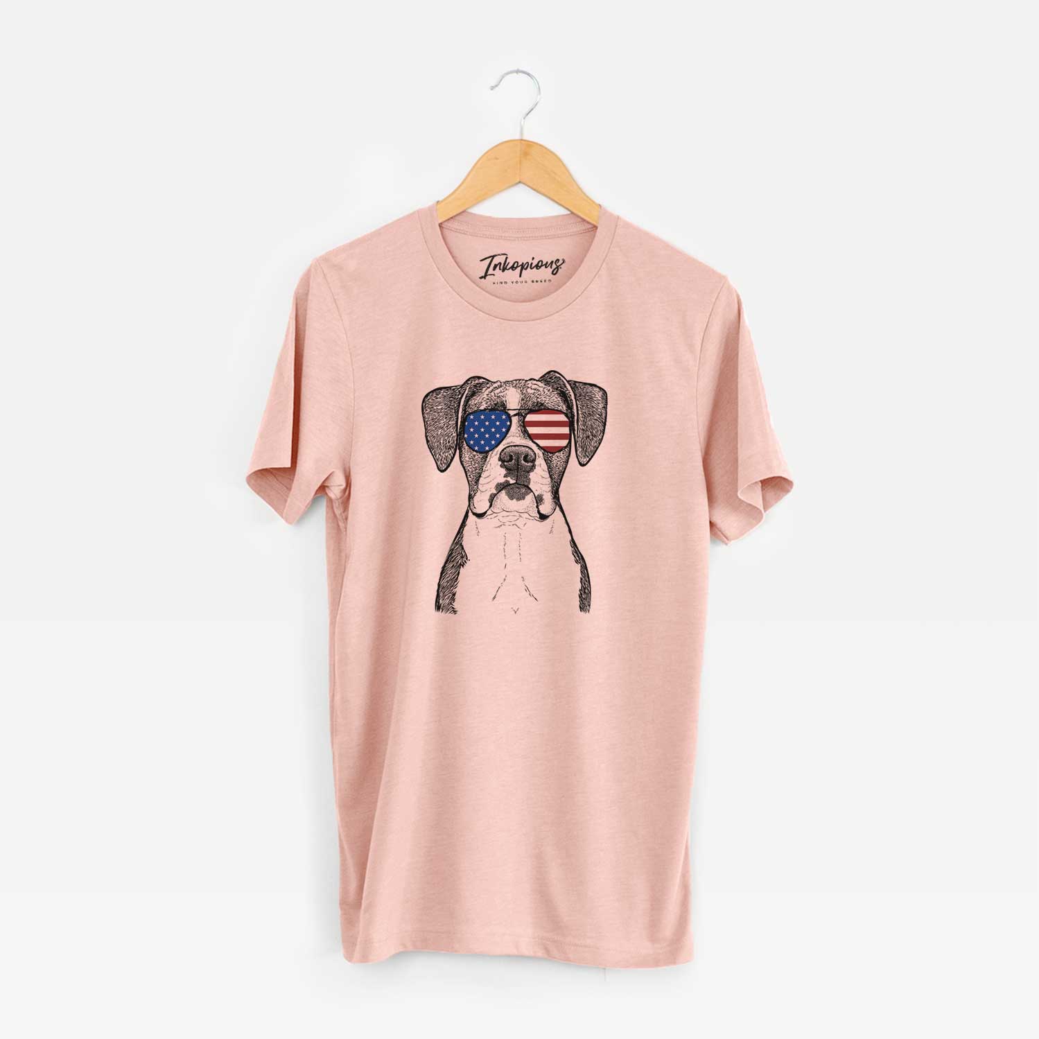 Hand-drawn sketch of Annie the Boxer wearing American flag sunglasses on a Peach Unisex crewneck