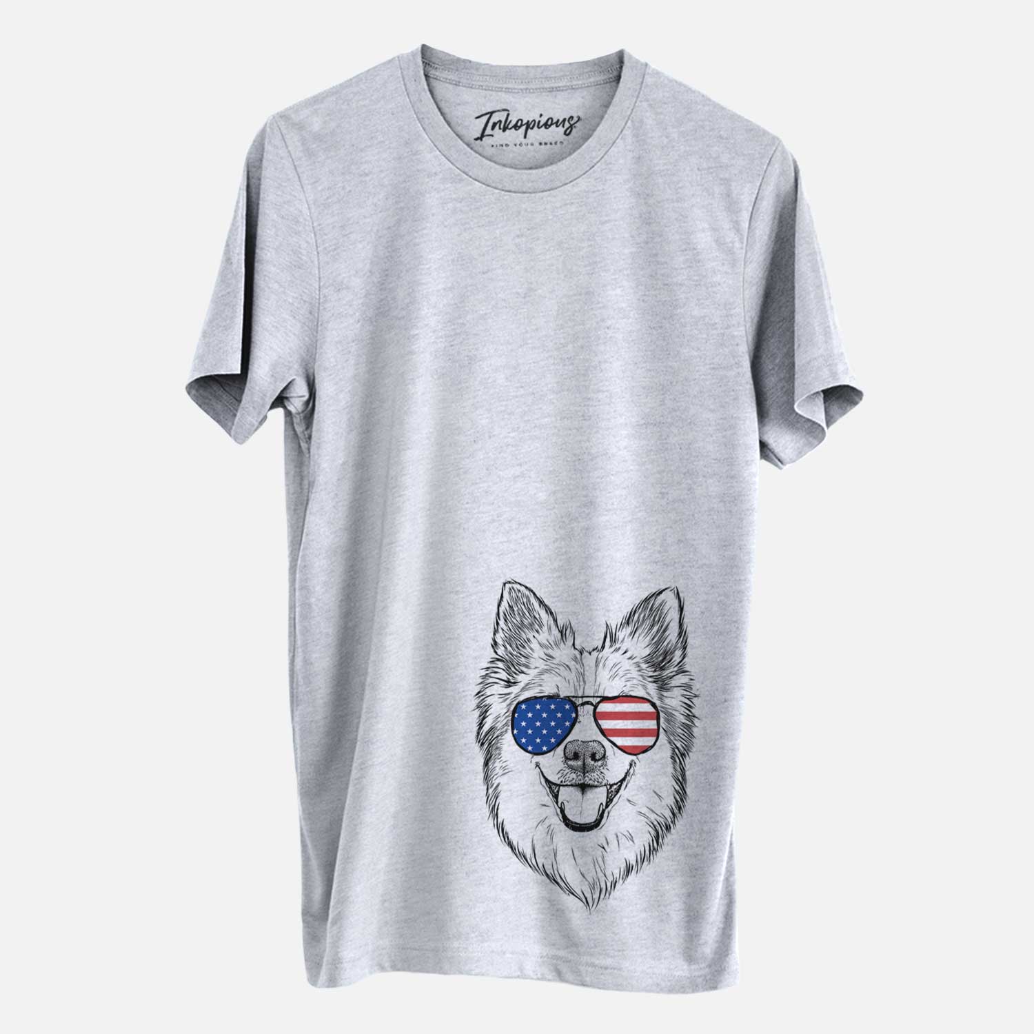 Hand-drawn sketch of Ari the Icelandic Sheepdog wearing American flag sunglasses on a Grey Unisex crewneck