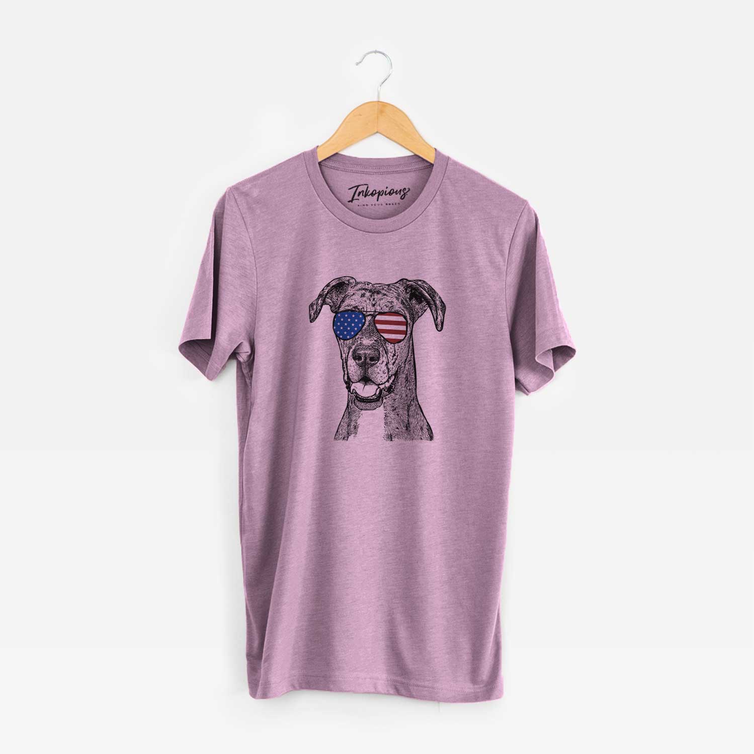 Hand-drawn sketch of Athena the Merle Great Dane wearing American flag sunglasses on an Orchid Unisex crewneck