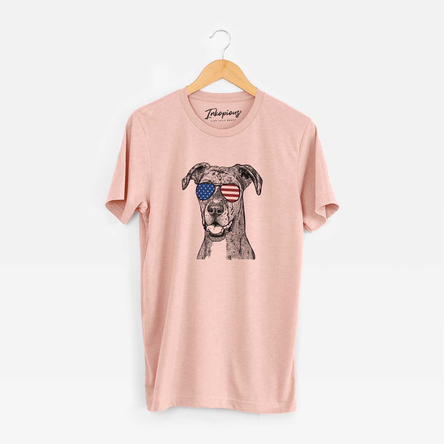Hand-drawn sketch of Athena the Merle Great Dane wearing American flag sunglasses on a Peach Unisex crewneck