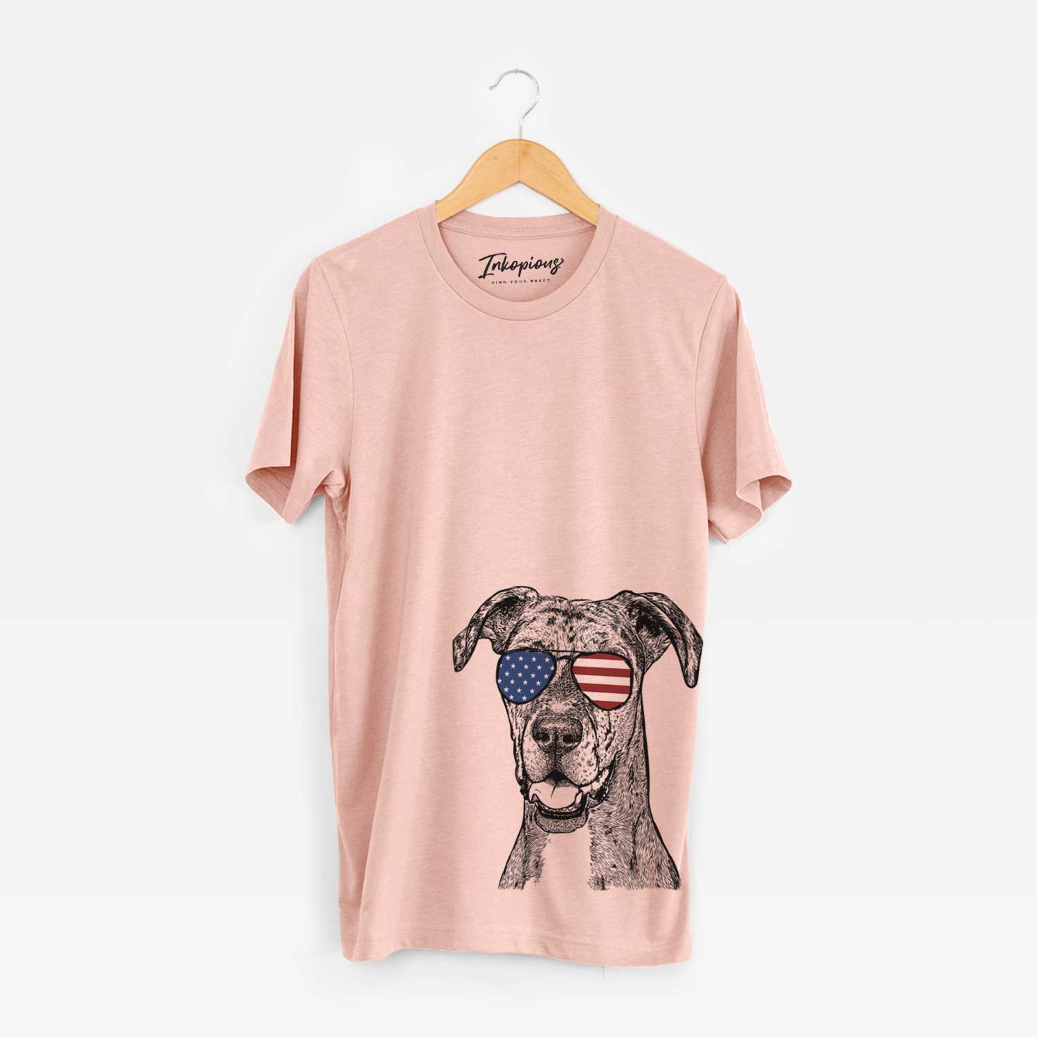 Hand-drawn sketch of Athena the Merle Great Dane wearing American flag sunglasses on a Peach Unisex crewneck