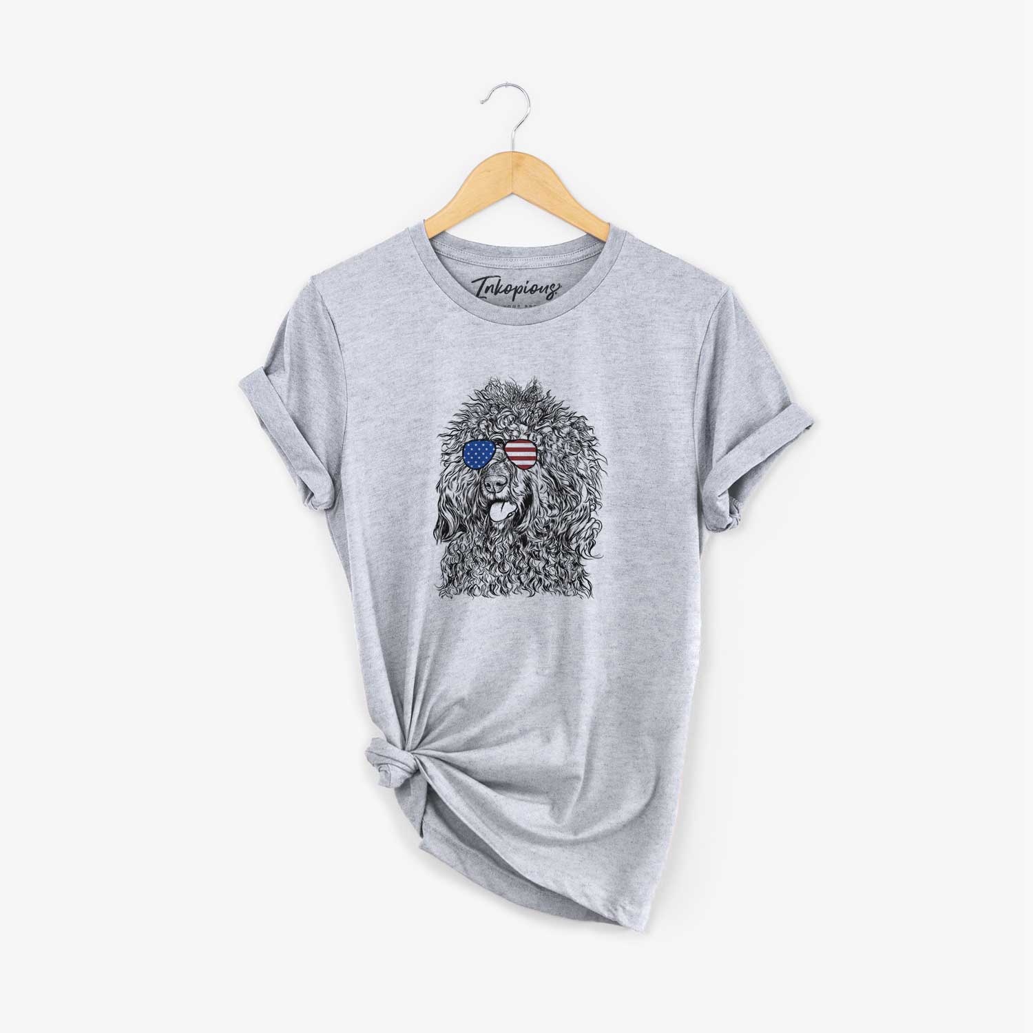 Hand-drawn sketch of Babs the Barbet wearing American flag sunglasses on a Grey Unisex crewneck