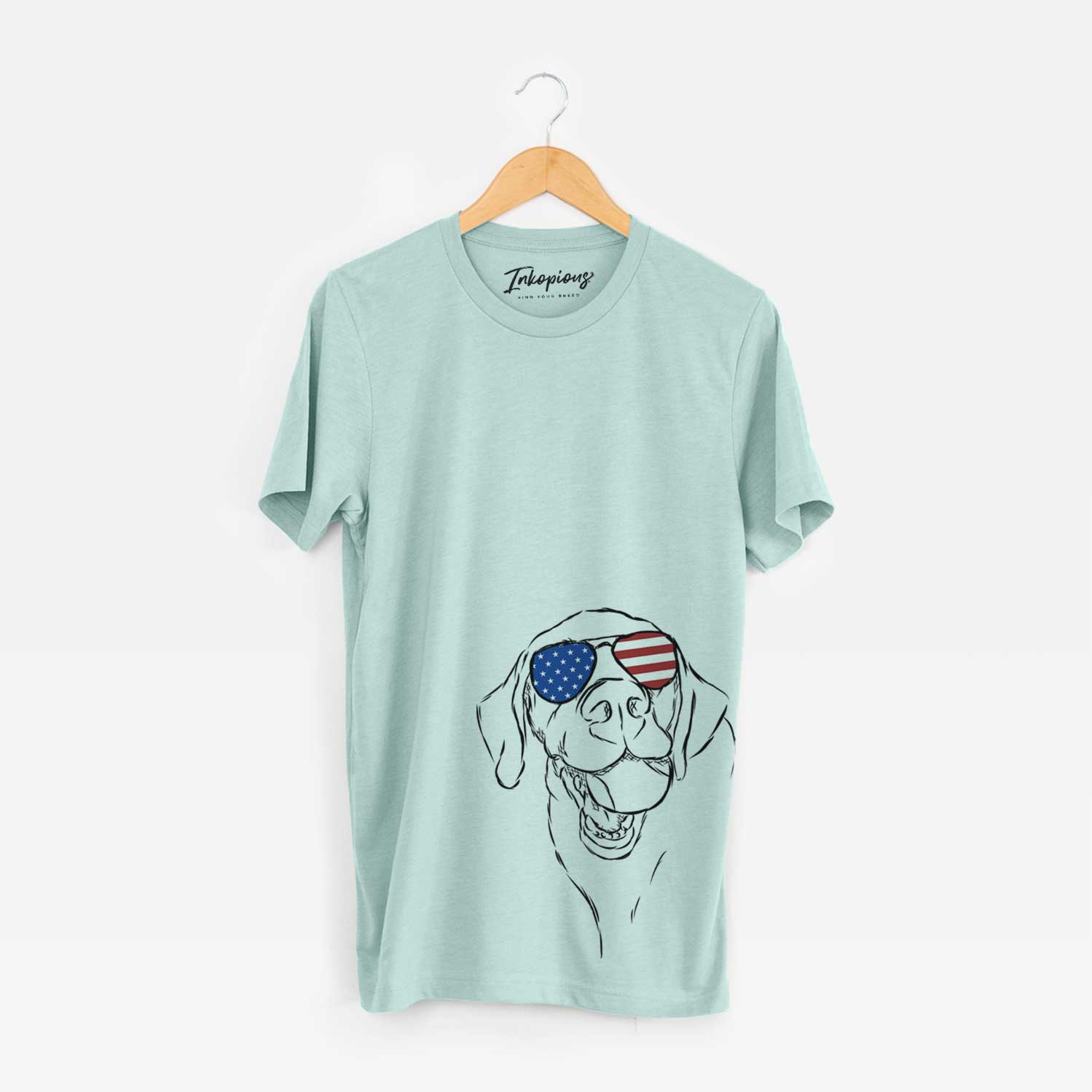 Hand-drawn sketch of Bailey the Labrador Retriever wearing American flag sunglasses on a Heather Sage Unisex crewneck