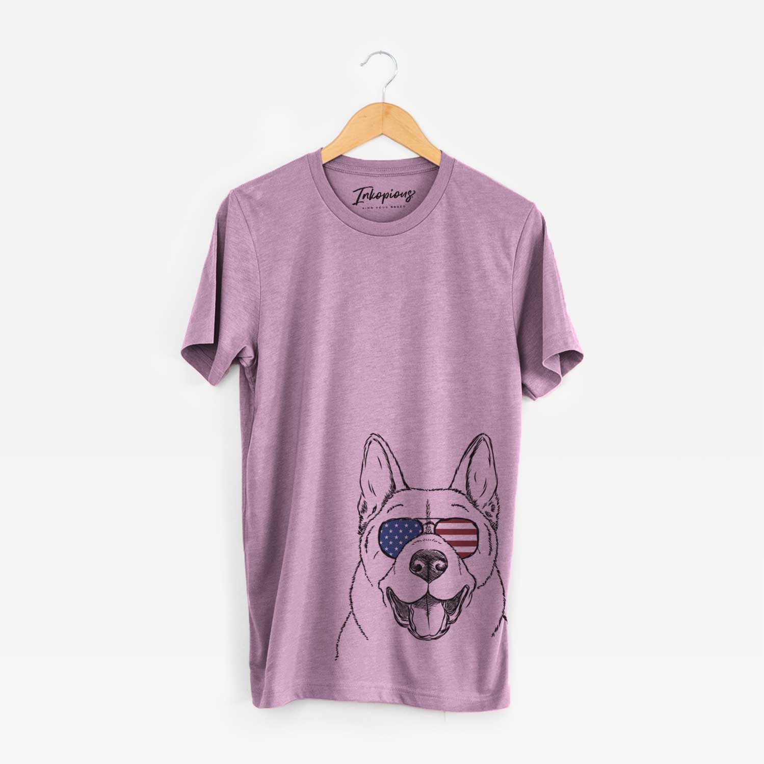 Hand-drawn sketch of Baku the Akita wearing American flag sunglasses on an Orchid Unisex crewneck