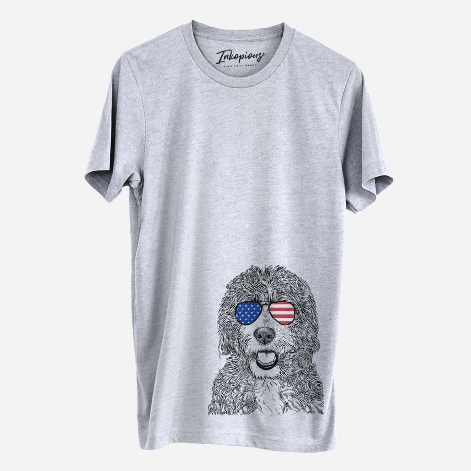 Hand-drawn sketch of Bash the Bernedoodle wearing American flag sunglasses on a Grey Unisex crewneck