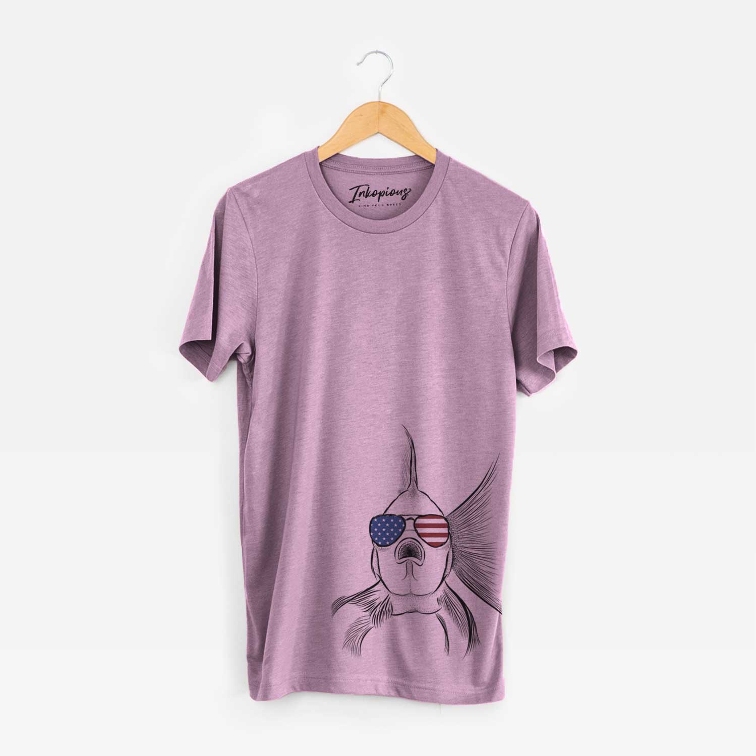 Hand-drawn sketch of Beefcake the Goldfish wearing American flag sunglasses on an Orchid Unisex crewneck