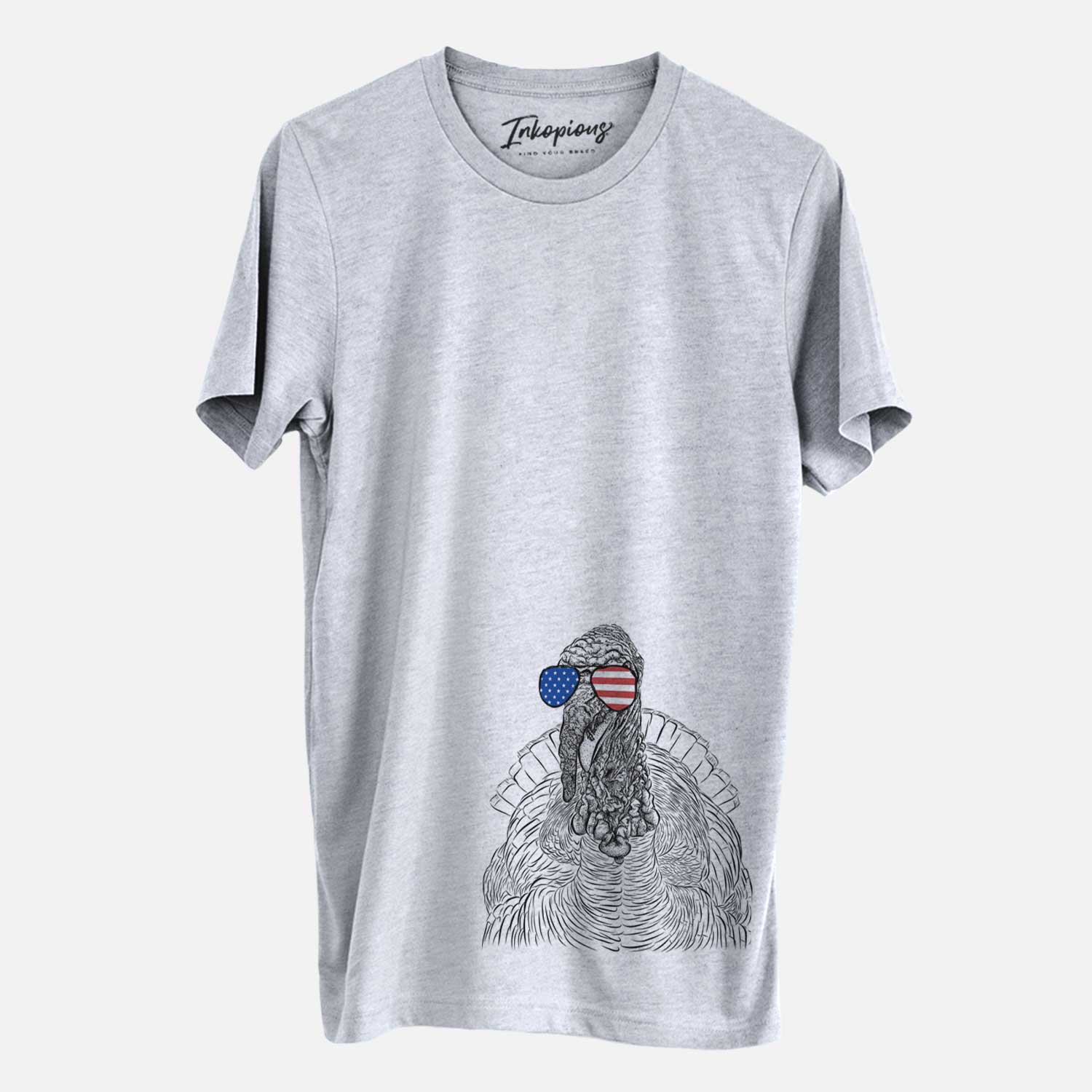 Hand-drawn sketch of Brady the Turkey wearing American flag sunglasses on a Grey Unisex crewneck