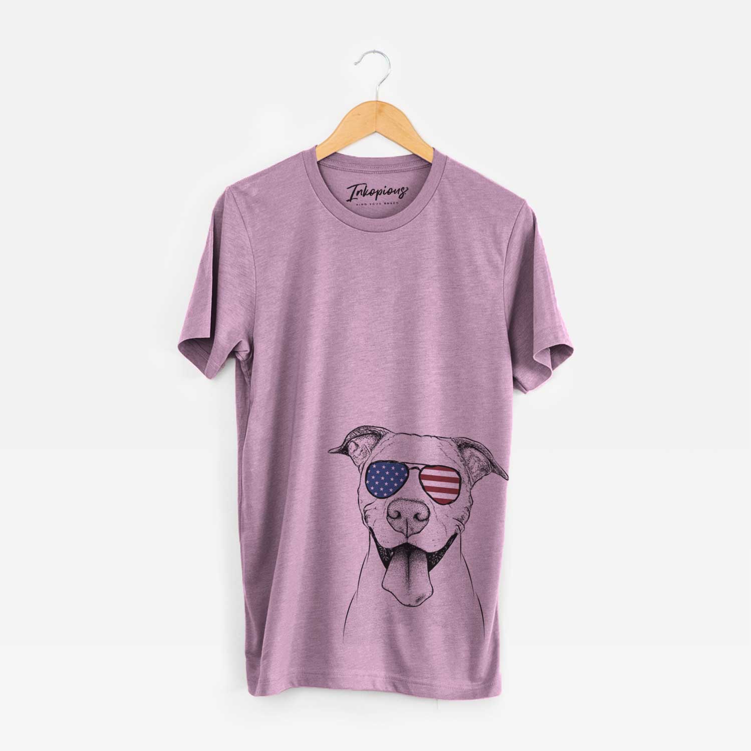 Hand-drawn sketch of Bruce the American Staffordshire Terrier wearing American flag sunglasses on an Orchid Unisex crewneck