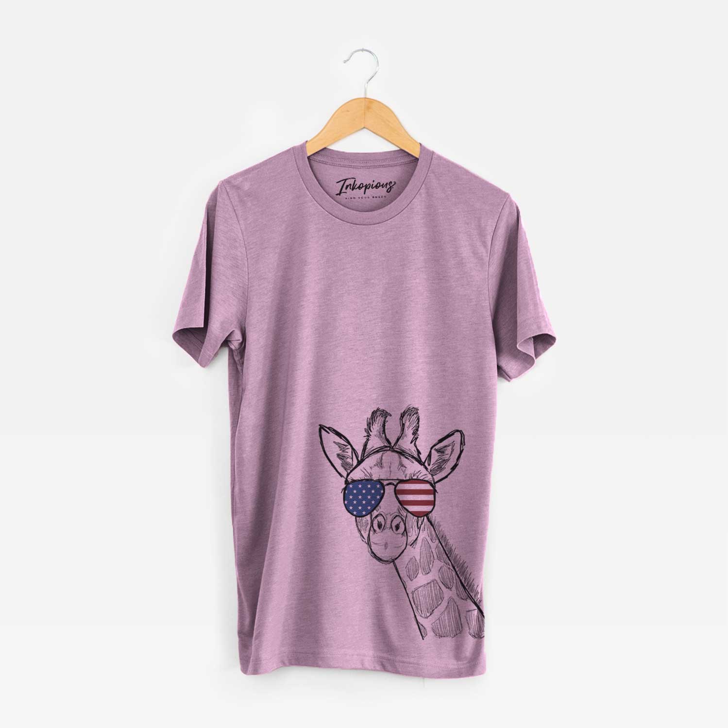 Hand-drawn sketch of Cedrick the Giraffe wearing American flag sunglasses on an Orchid Unisex crewneck