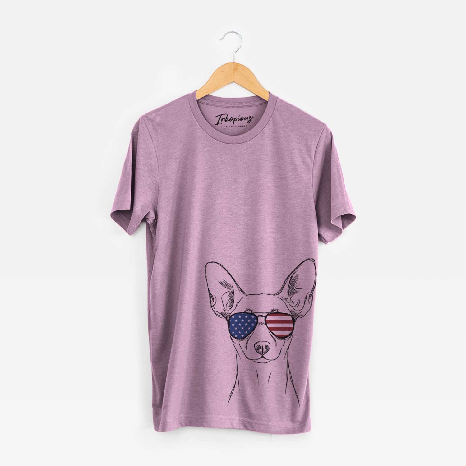 Hand-drawn sketch of Chillie the Mini Pinscher wearing American flag sunglasses on an Orchid Unisex crewneck