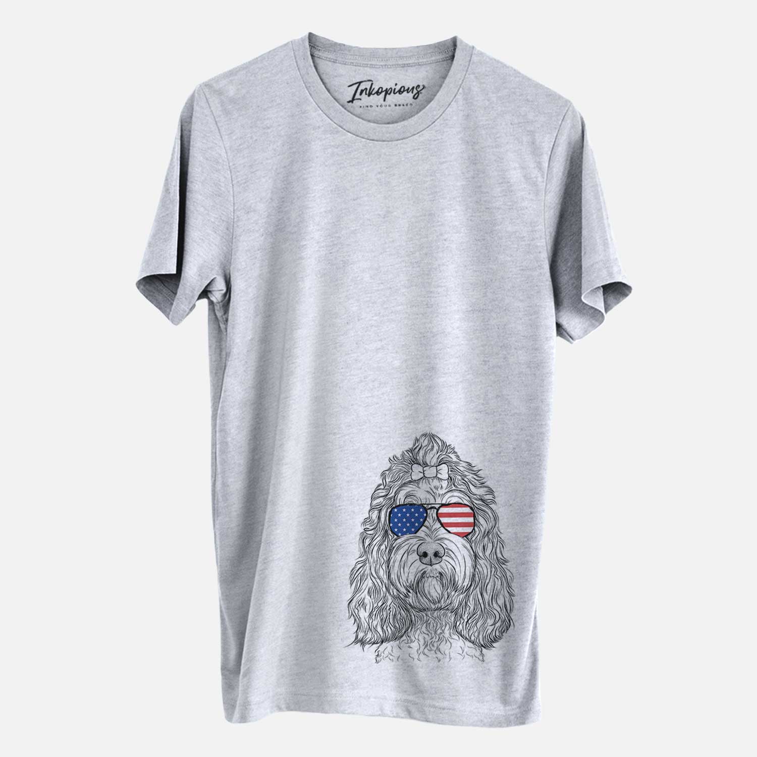 Hand-drawn sketch of Chloe the Cockapoo wearing American flag sunglasses on a Grey Unisex crewneck