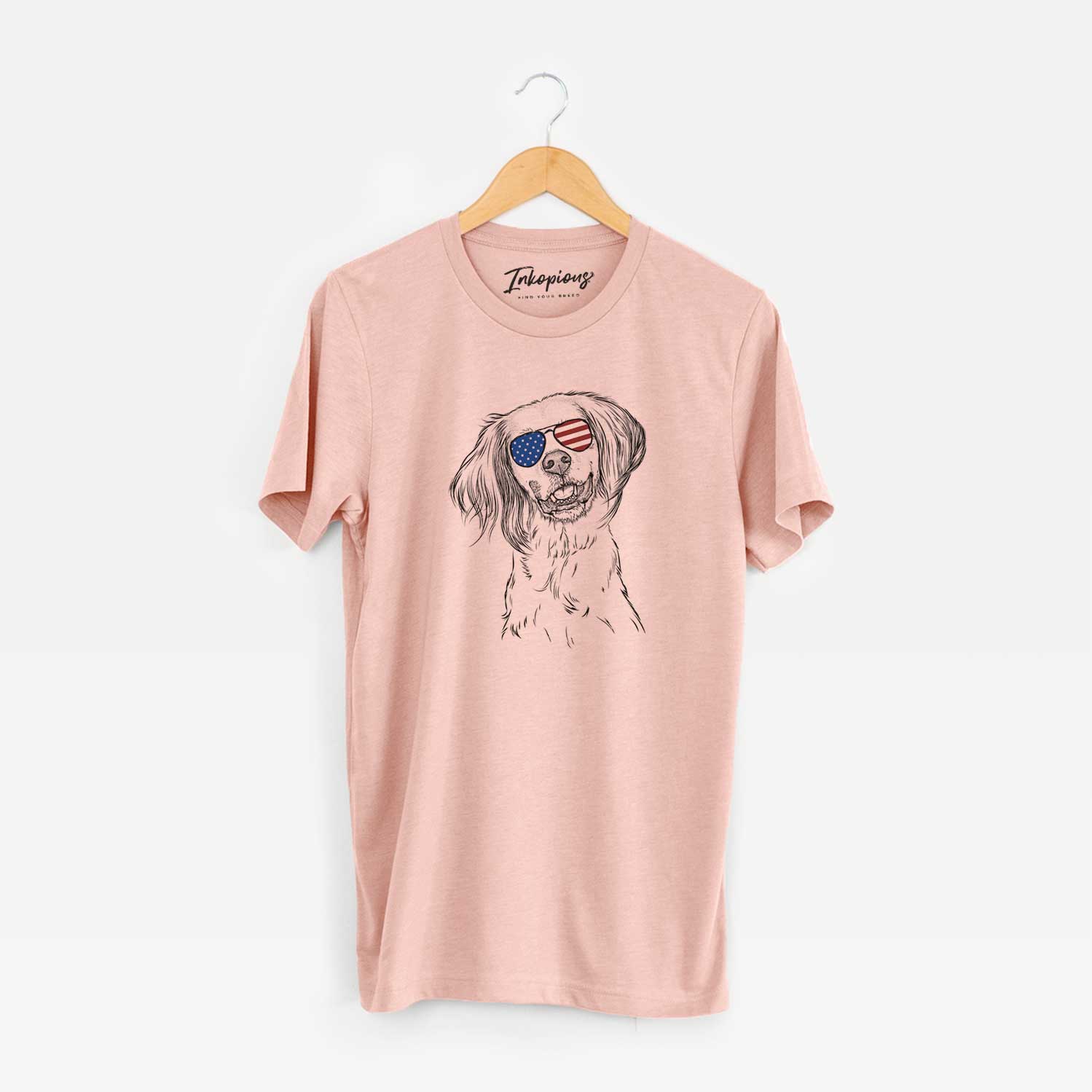 Hand-drawn sketch of Cooper the English Setter wearing American flag sunglasses on a Peach Unisex crewneck