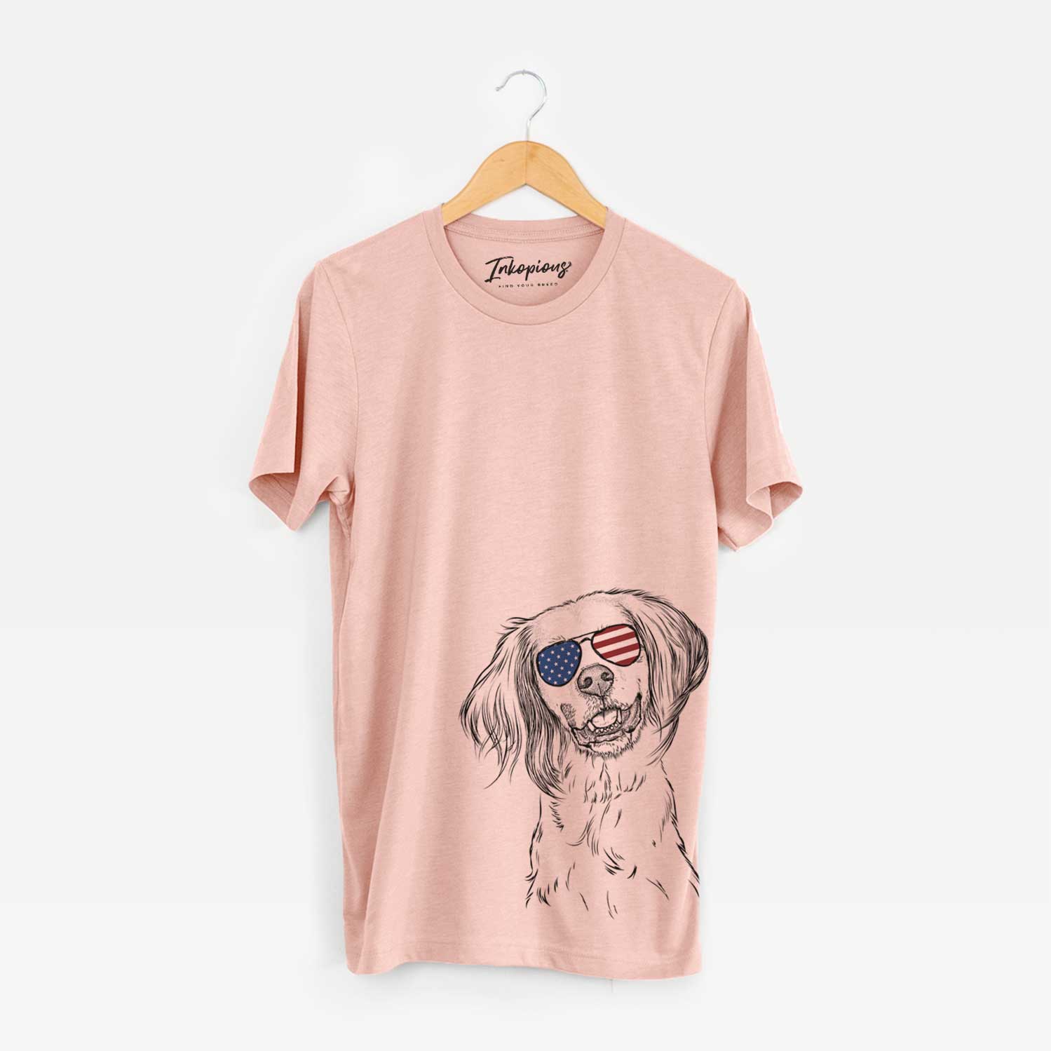 Hand-drawn sketch of Cooper the English Setter wearing American flag sunglasses on a Peach Unisex crewneck