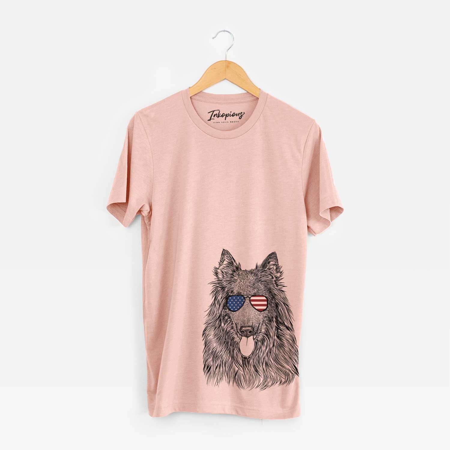 Hand-drawn sketch of Daan the Belgian Shepherd wearing American flag sunglasses on a Peach Unisex crewneck