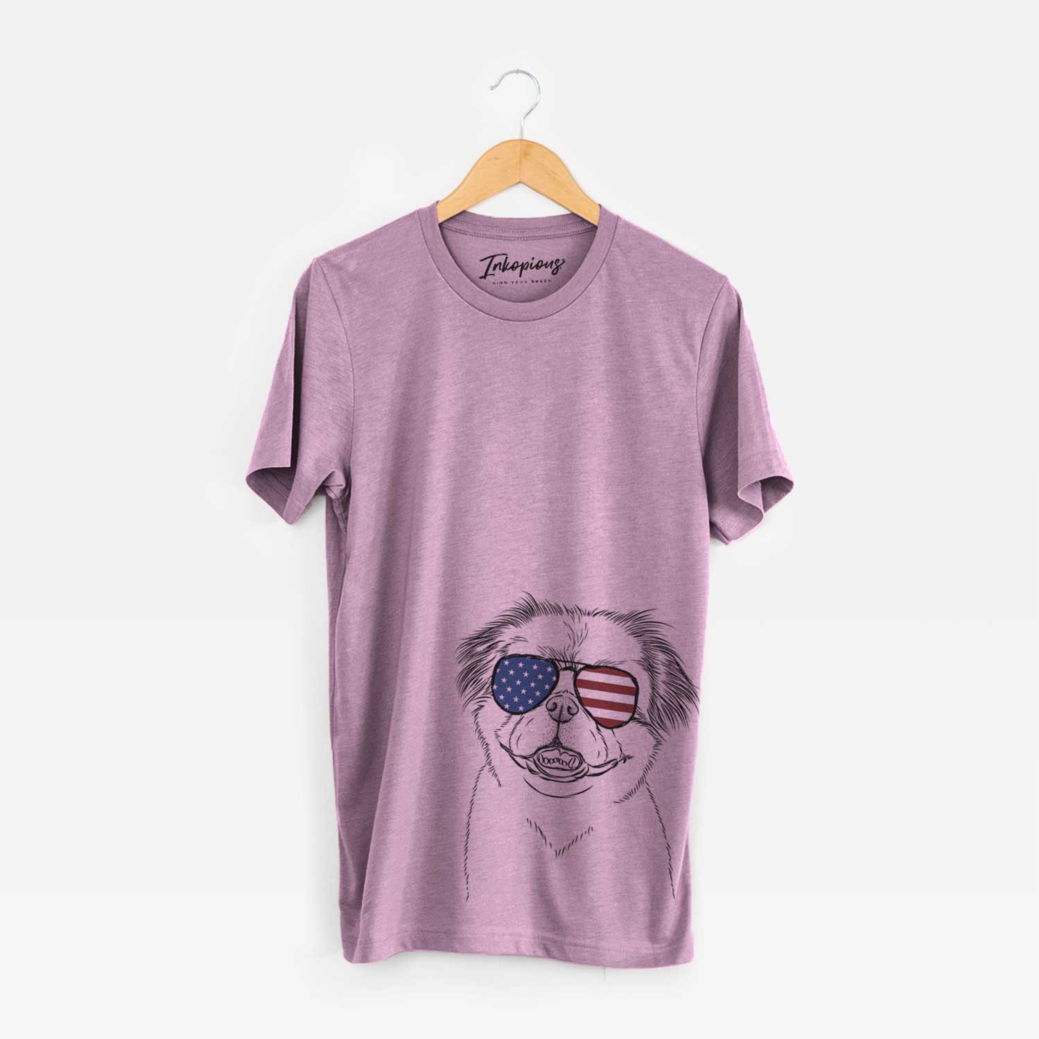 Hand-drawn sketch of Danny the Pekingese wearing American flag sunglasses on an Orchid Unisex crewneck