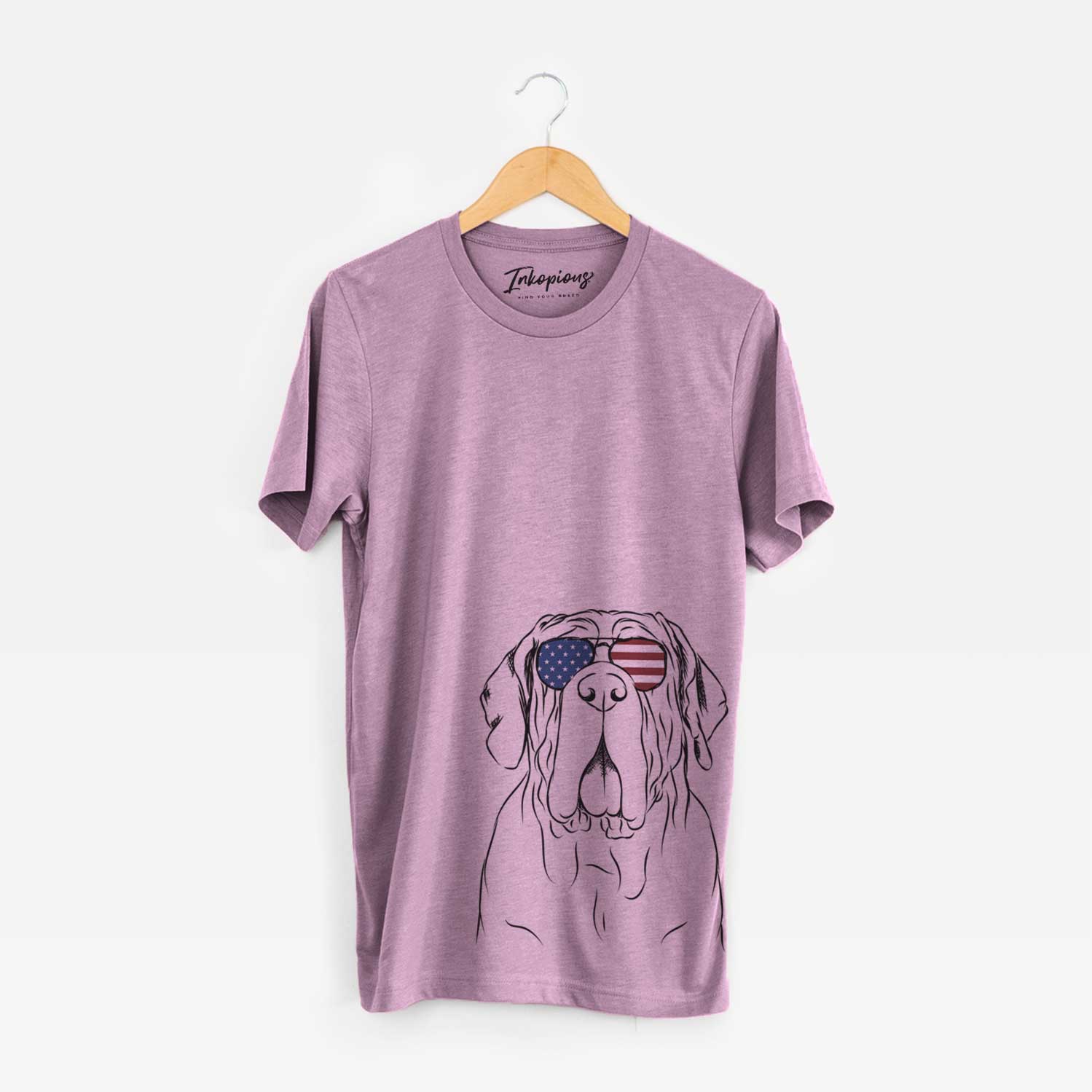 Hand-drawn sketch of Dinah the Neapolitan Mastiff wearing American flag sunglasses on an Orchid Unisex crewneck