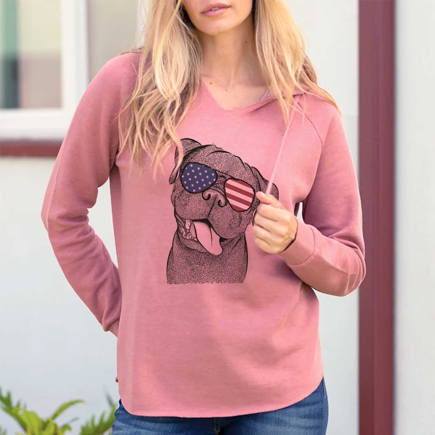 Hand-drawn sketch of Dudley Danger the Pug wearing American flag sunglasses on a Dusty Rose Cali Wave Hooded Sweatshirt, lifestyle photo
