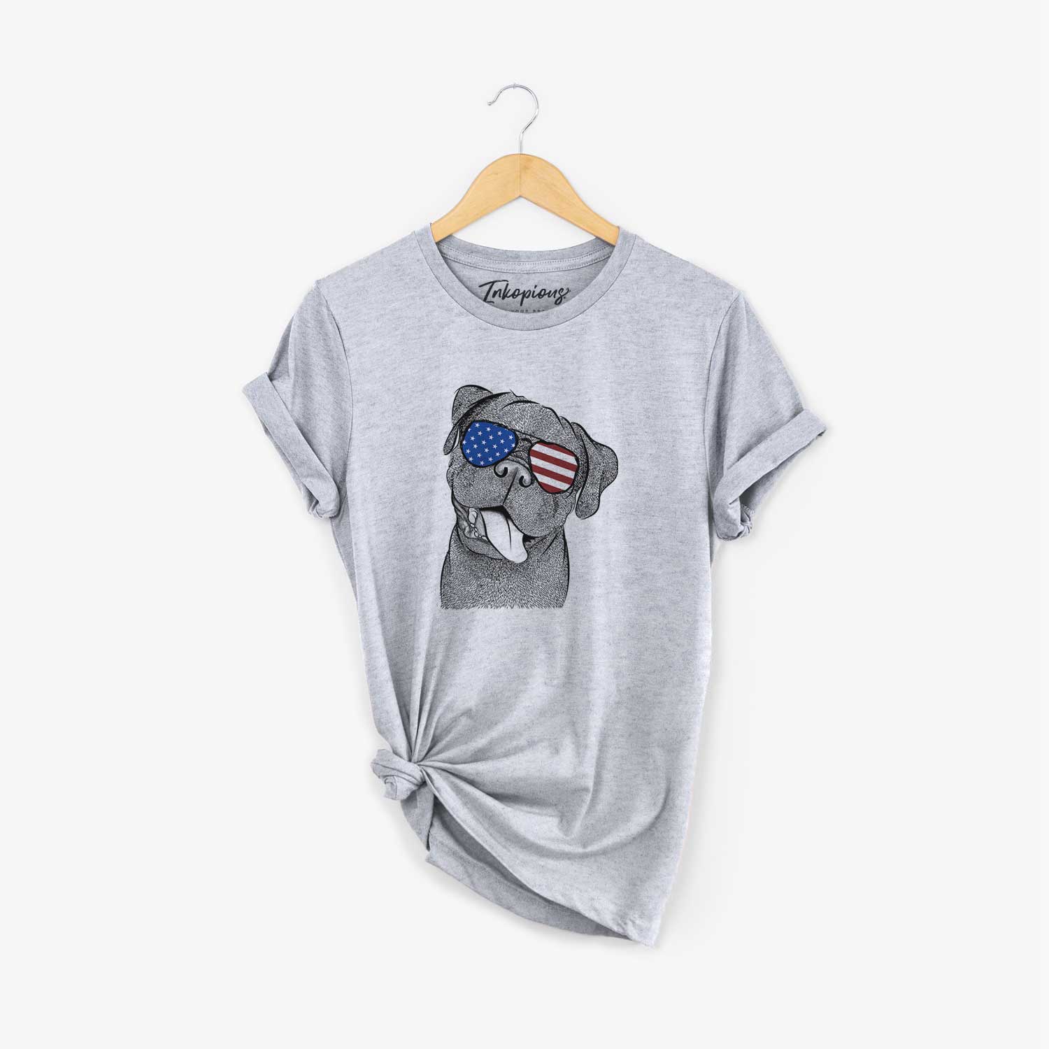 Hand-drawn sketch of Dudley Danger the Pug wearing American flag sunglasses on a Grey Unisex crewneck