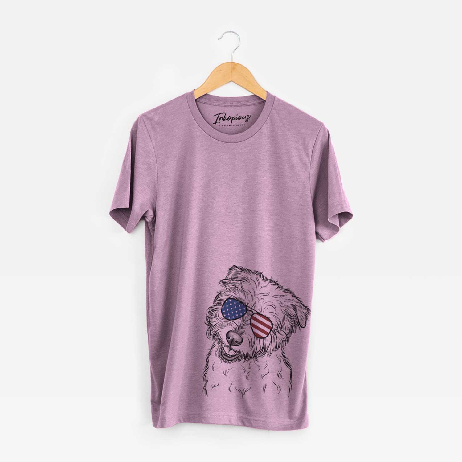 Hand-drawn sketch of Duffy the Glen of Imaal Terrier wearing American flag sunglasses on an Orchid Unisex crewneck
