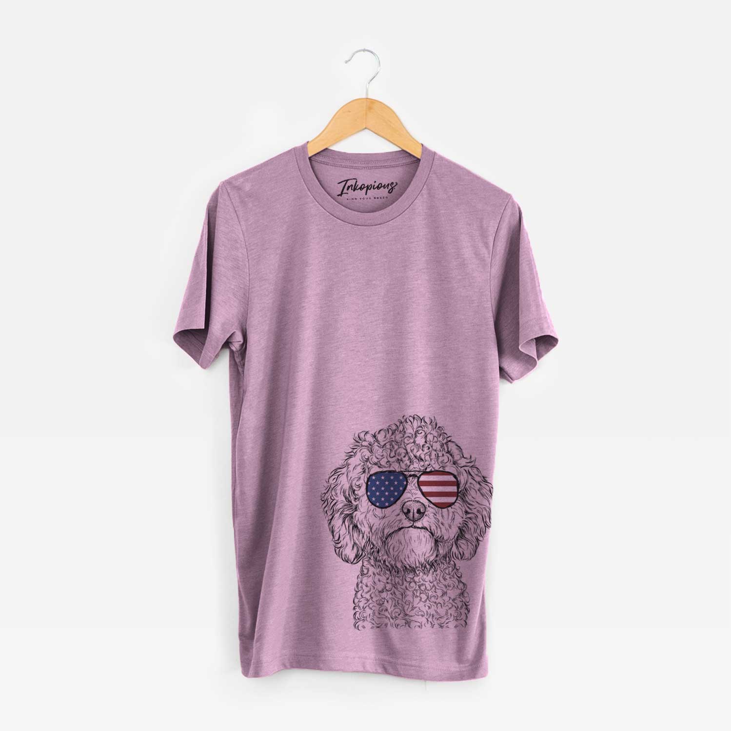 Hand-drawn sketch of Edgar the Shihpoo wearing American flag sunglasses on an Orchid Unisex crewneck