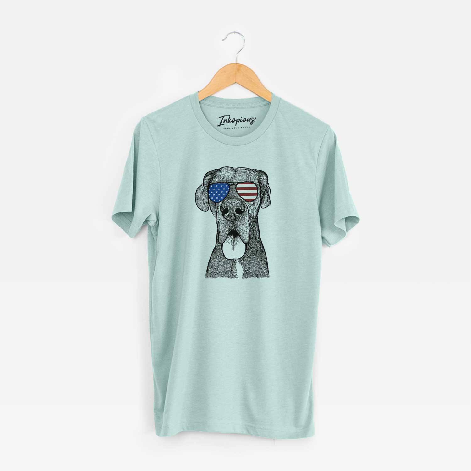 Hand-drawn sketch of Eli the Great Dane wearing American flag sunglasses on a Heather Sage Unisex crewneck