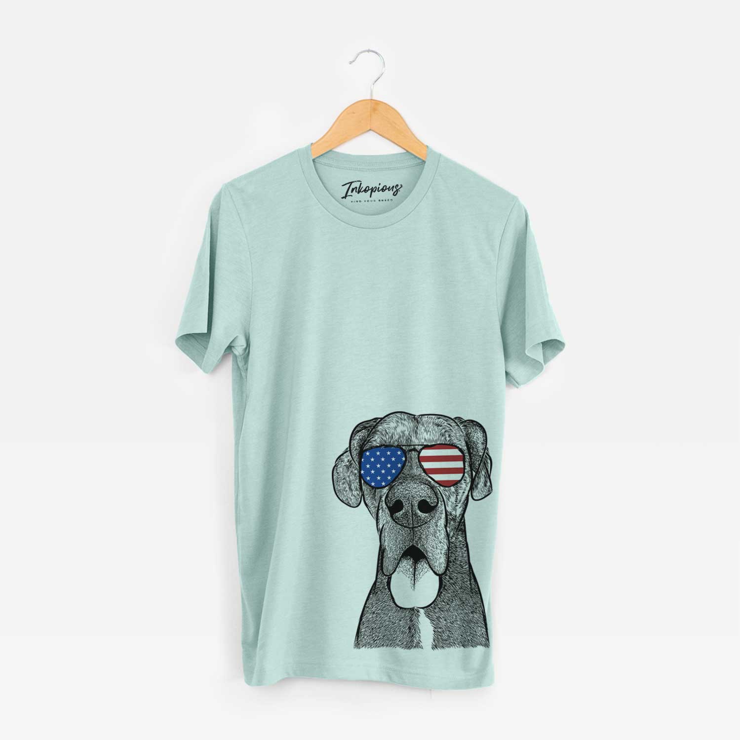 Hand-drawn sketch of Eli the Great Dane wearing American flag sunglasses on a Heather Sage Unisex crewneck