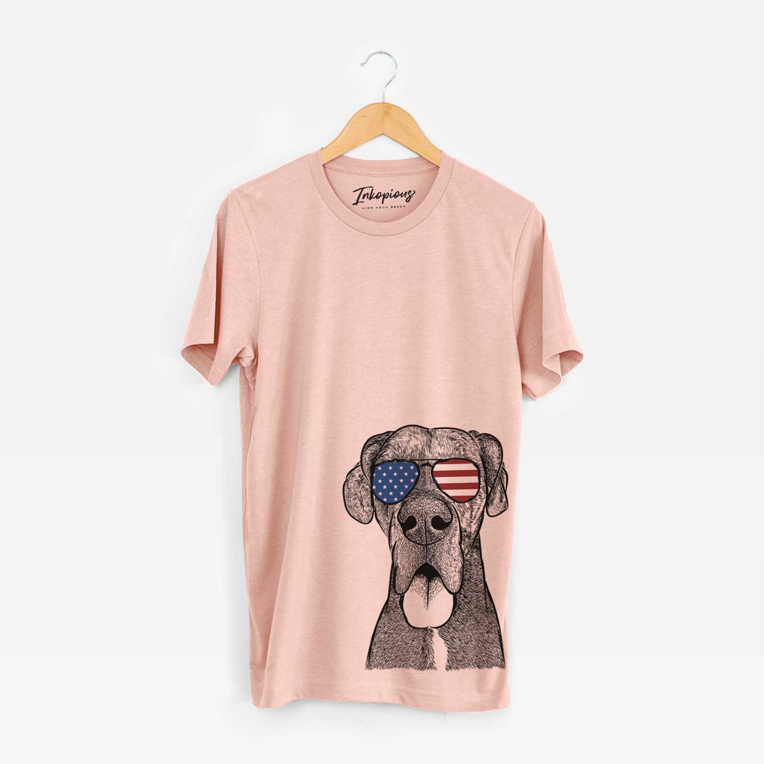 Hand-drawn sketch of Eli the Great Dane wearing American flag sunglasses on a Peach Unisex crewneck