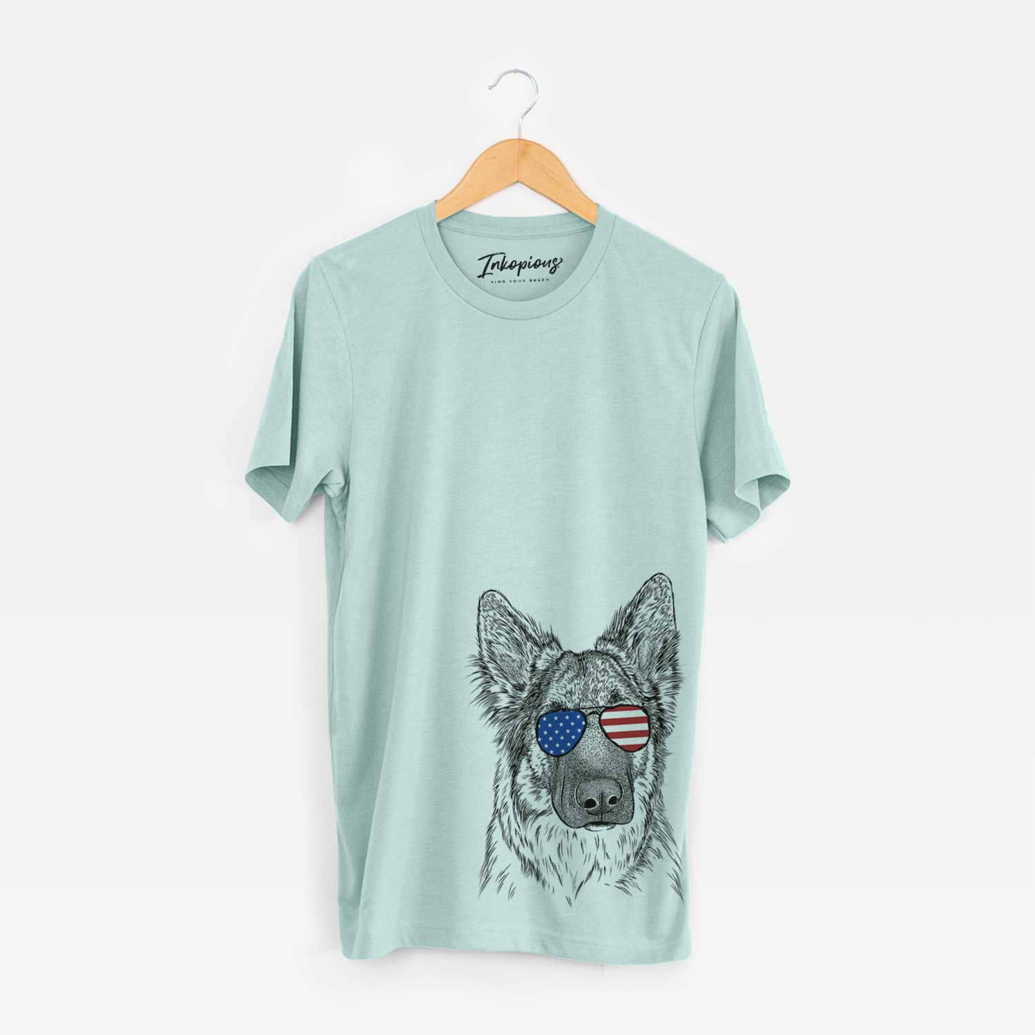 Hand-drawn sketch of Geddy the Shiloh Shepherd wearing American flag sunglasses on a Heather Sage Unisex crewneck