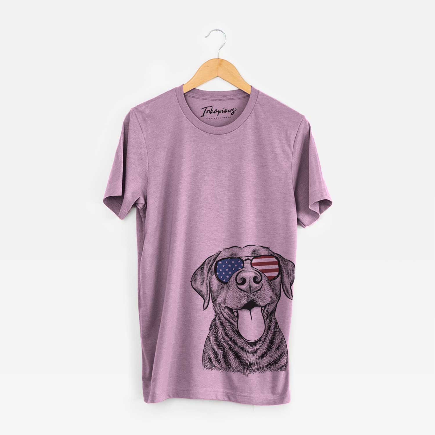Hand-drawn sketch of Gwen the Labrador Retriever wearing American flag sunglasses on an Orchid Unisex crewneck