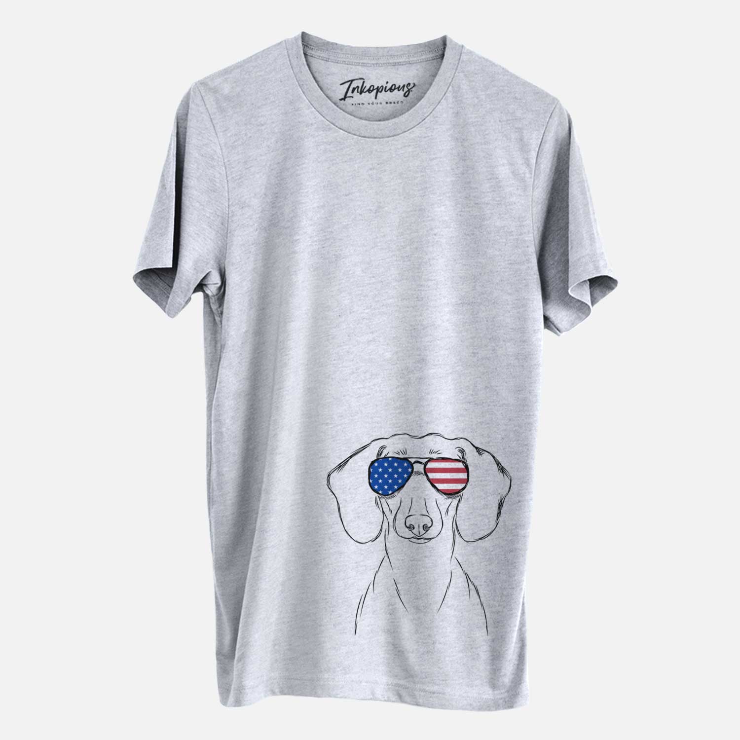 Hand-drawn sketch of Hans the Dachshund wearing American flag sunglasses on a Grey Unisex crewneck