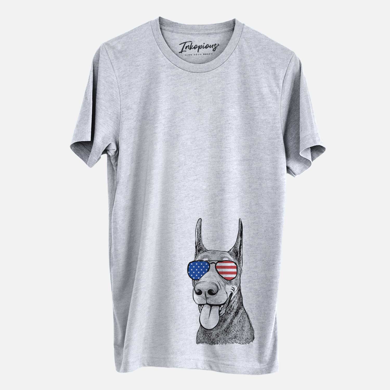 Hand-drawn sketch of Happy Sunny the Doberman Pinscher wearing American flag sunglasses on a Grey Unisex crewneck