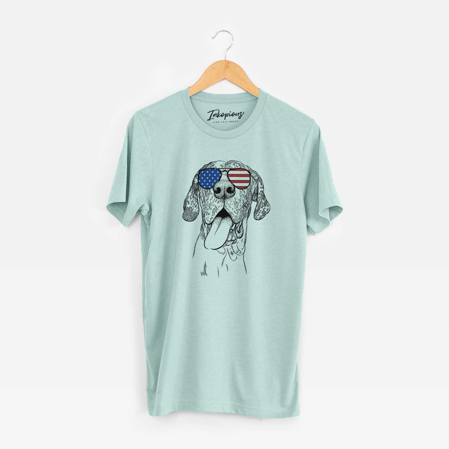 Hand-drawn sketch of Hennessey the Great Dane wearing American flag sunglasses on a Heather Sage Unisex crewneck
