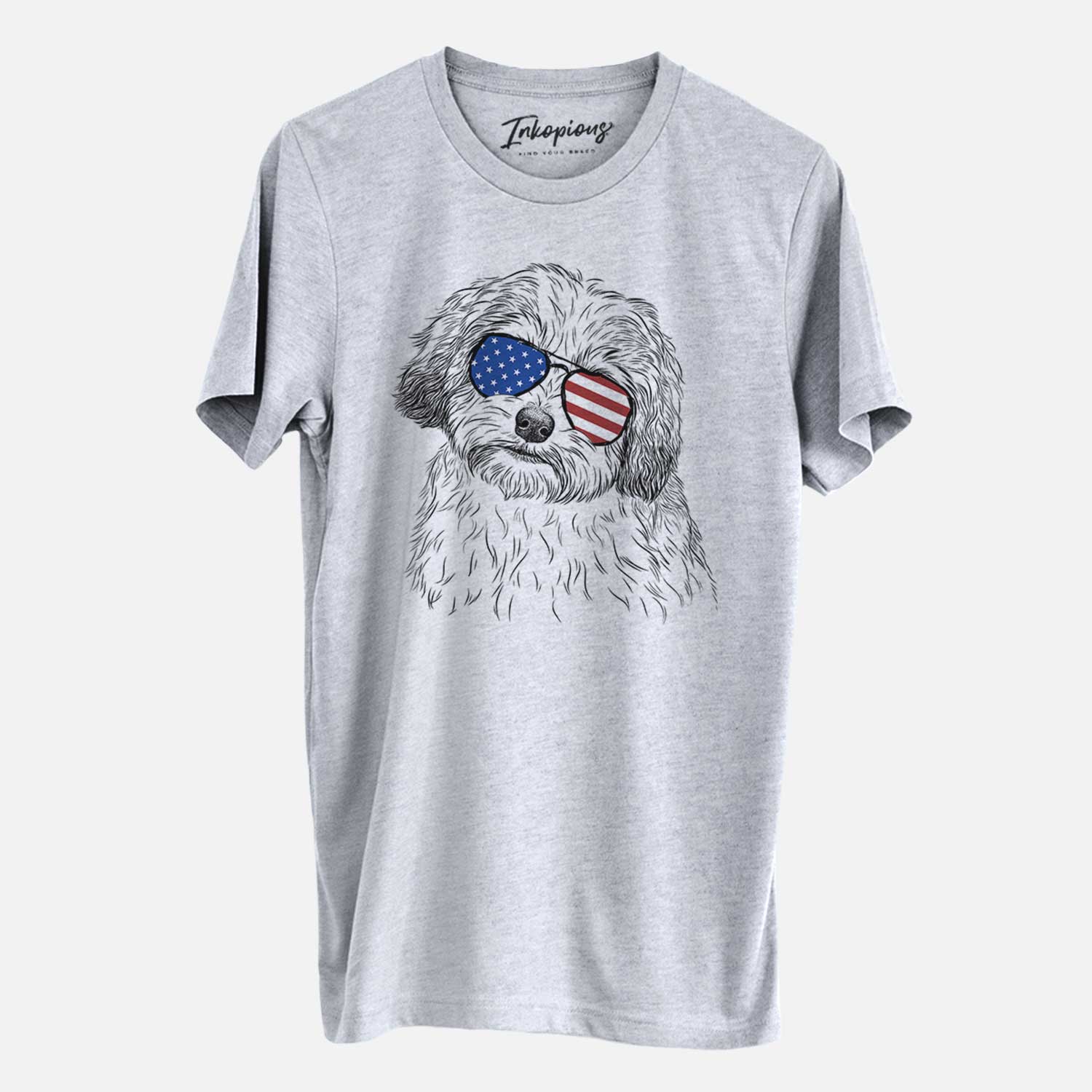 Hand-drawn sketch of Henry the Havanese wearing American flag sunglasses on a Grey Unisex crewneck