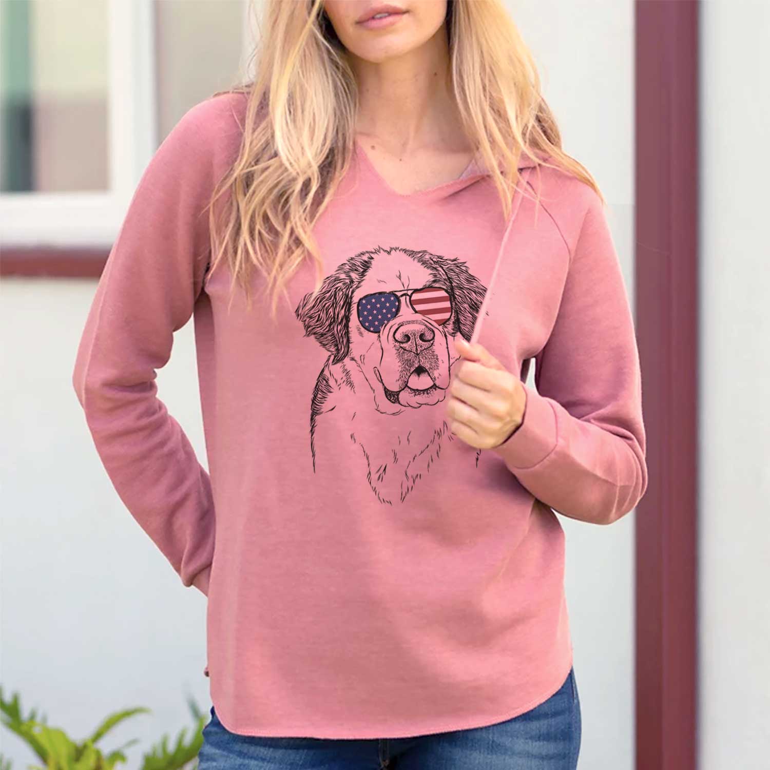 Hand-drawn sketch of Hook the Saint Bernard wearing American flag sunglasses on a Dusty Rose Cali Wave Hooded Sweatshirt, lifestyle photo