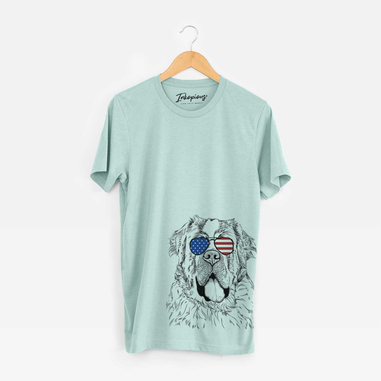 Hand-drawn sketch of Hoss the Saint Bernard wearing American flag sunglasses on a Heather Sage Unisex crewneck
