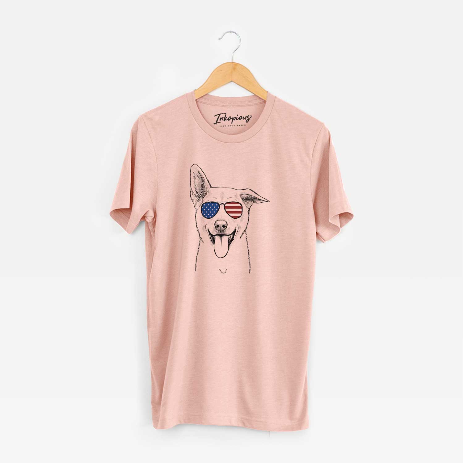 Hand-drawn sketch of Hoya the Korean Jindo wearing American flag sunglasses on a Peach Unisex crewneck
