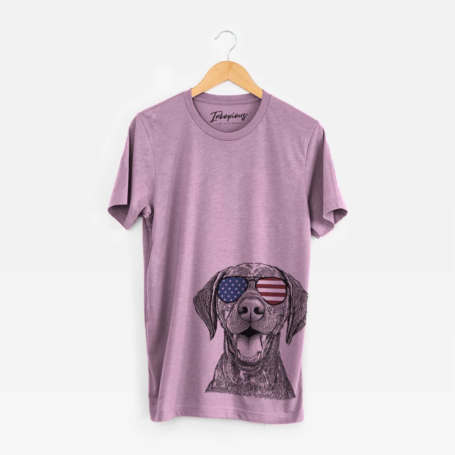 Hand-drawn sketch of Hudson the German Shorthaired Pointer wearing American flag sunglasses on an Orchid Unisex crewneck