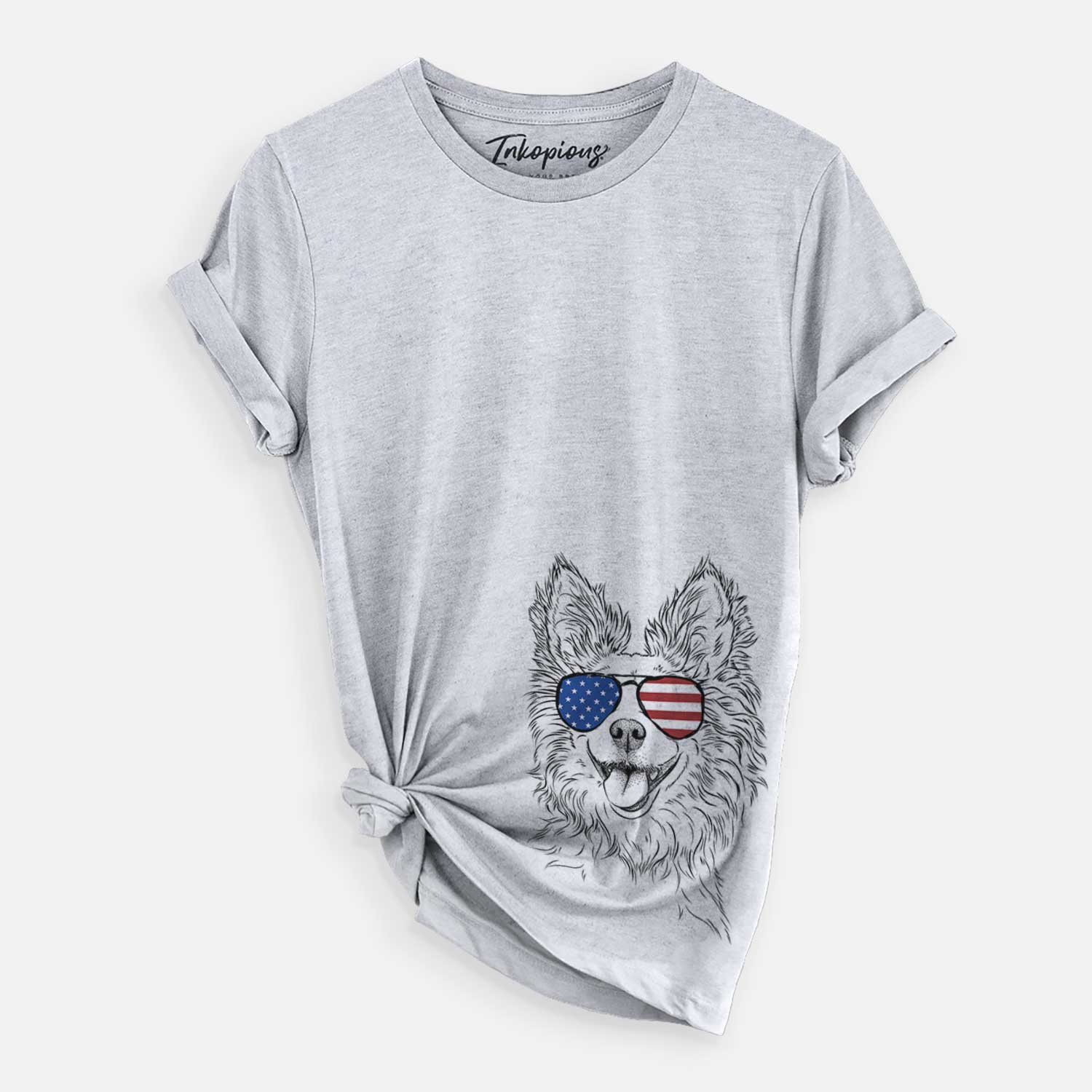 Hand-drawn sketch of Jasper the Pomchi wearing American flag sunglasses on a Grey Unisex crewneck