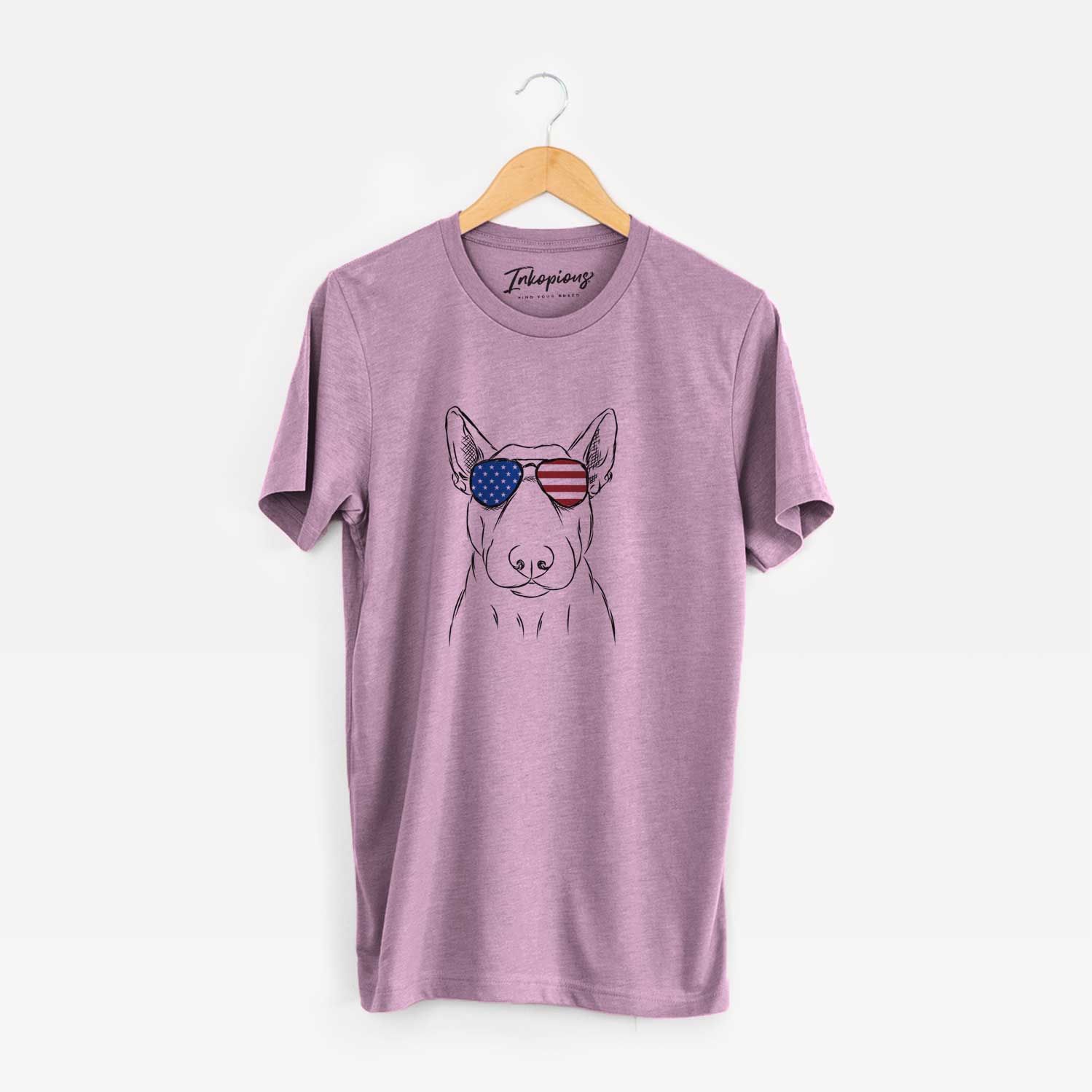 Hand-drawn sketch of Jett the Bull Terrier wearing American flag sunglasses on an Orchid Unisex crewneck