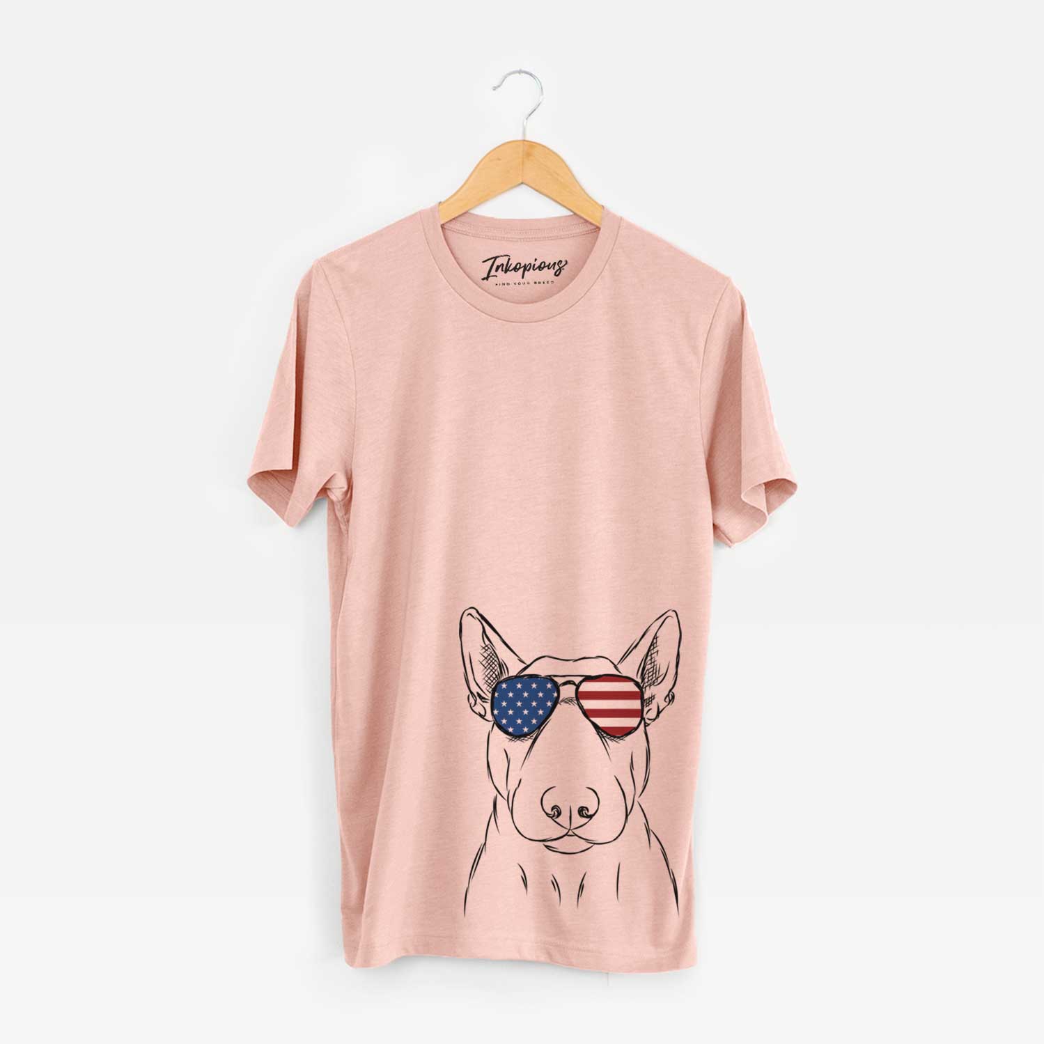 Hand-drawn sketch of Jett the Bull Terrier wearing American flag sunglasses on a Peach Unisex crewneck
